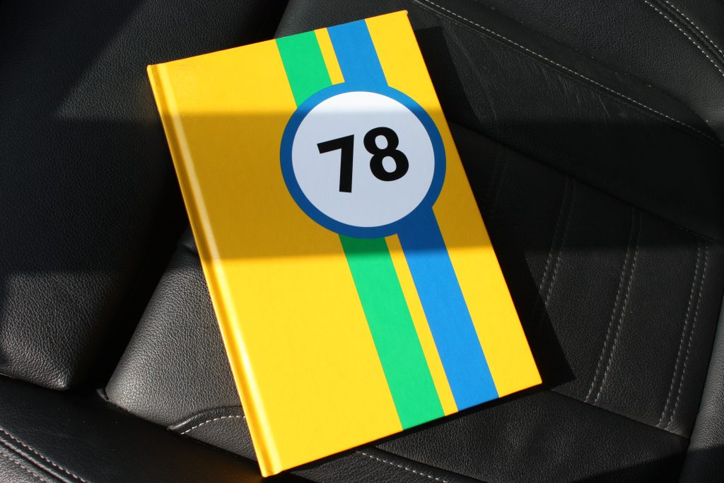 A jotter pad resting on a car seat