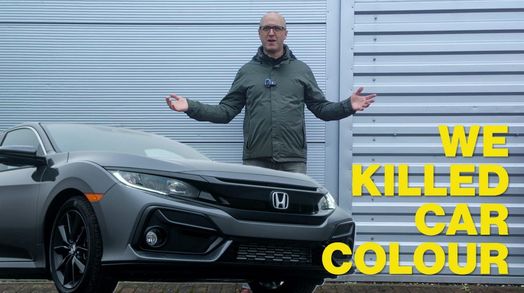 A YouTube video thumbnail featuring a dull grey Honda Civic.